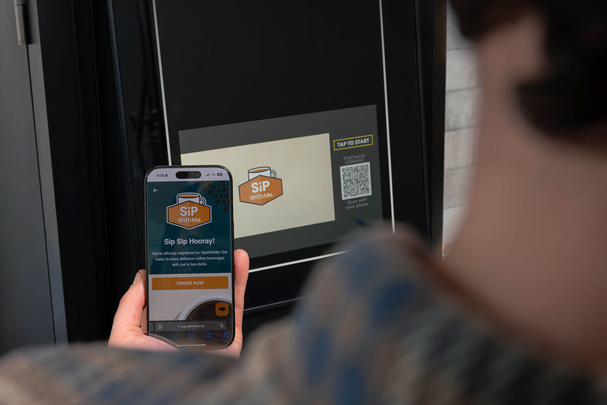 ordering a coffee from a sipwithme coffee amenity using a cellphone