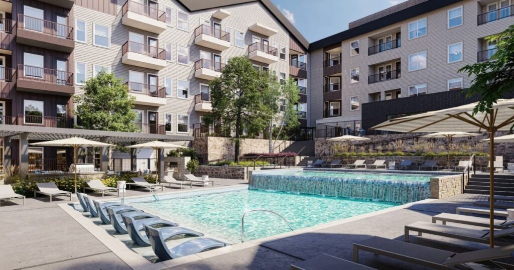 Resort-style pool and apartment buildings at Jefferson Arbor in Anna, Texas